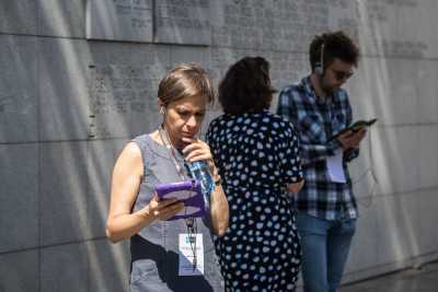 Educators in Poland taking the IWalk tour at the site of the Warsaw ghetto
